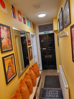 Downstairs hallway – artwork and seating