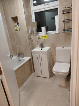 Upstairs bathroom – sink, toilet and bath